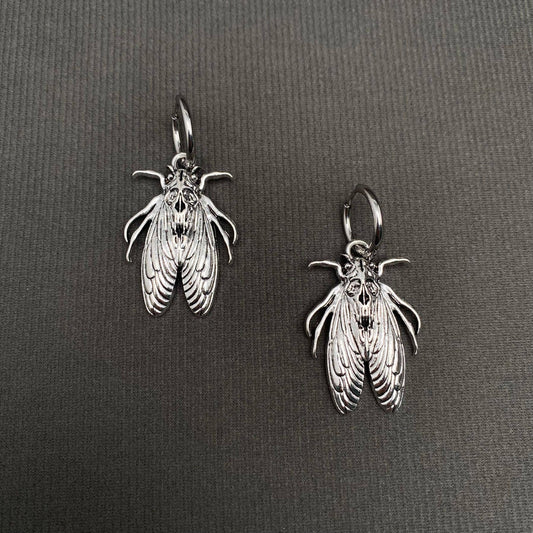 Silver Tone Moth Huggie Earrings
