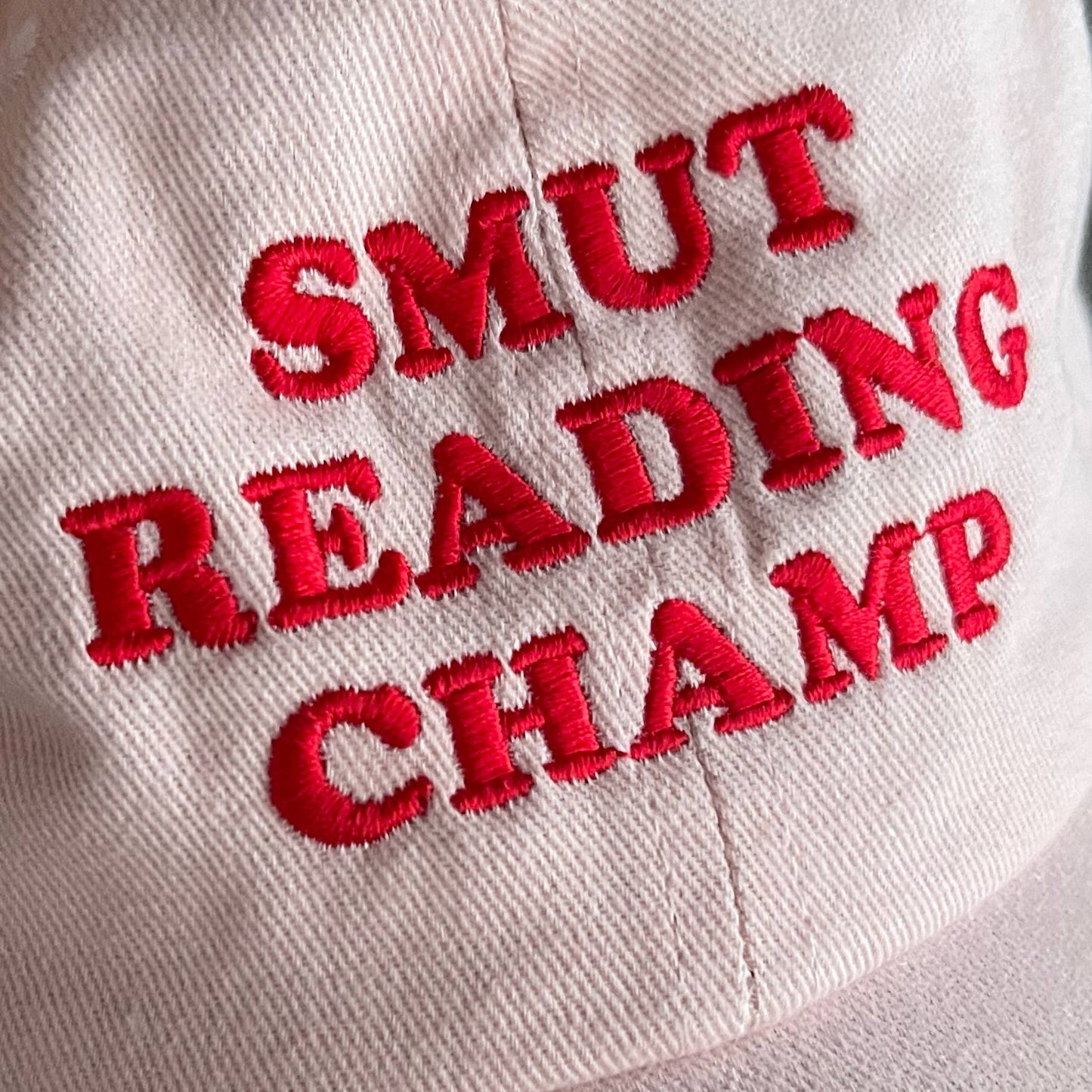 The Silver Spider • “Smut Reading Champ” Baseball Dad Hat, Pink