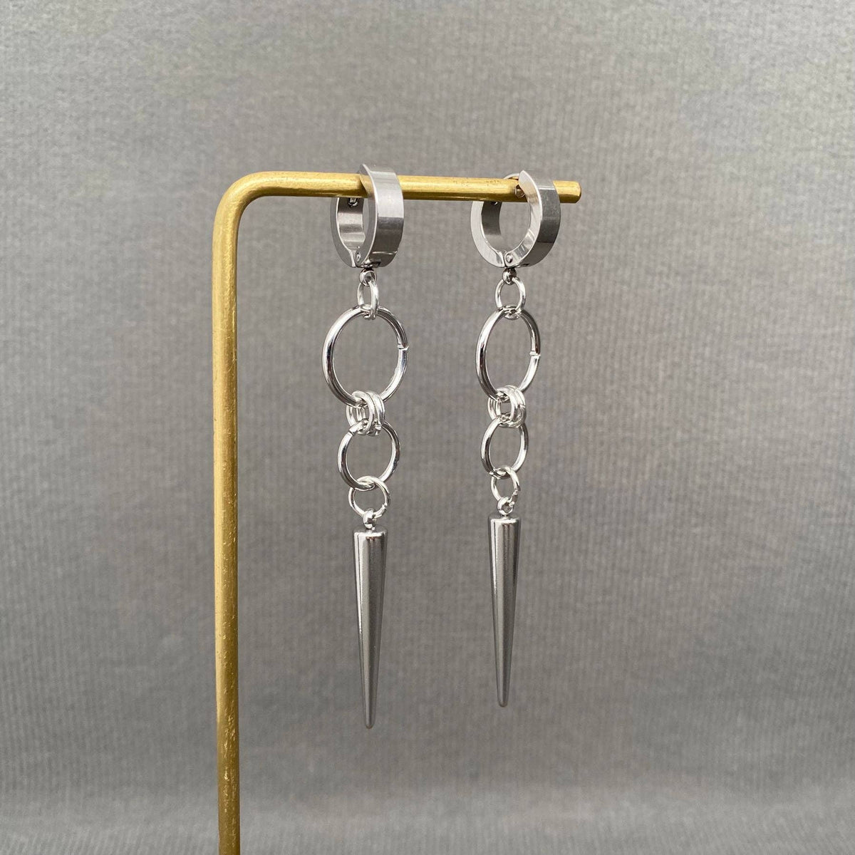 Silver Tone Spike Huggie Earrings