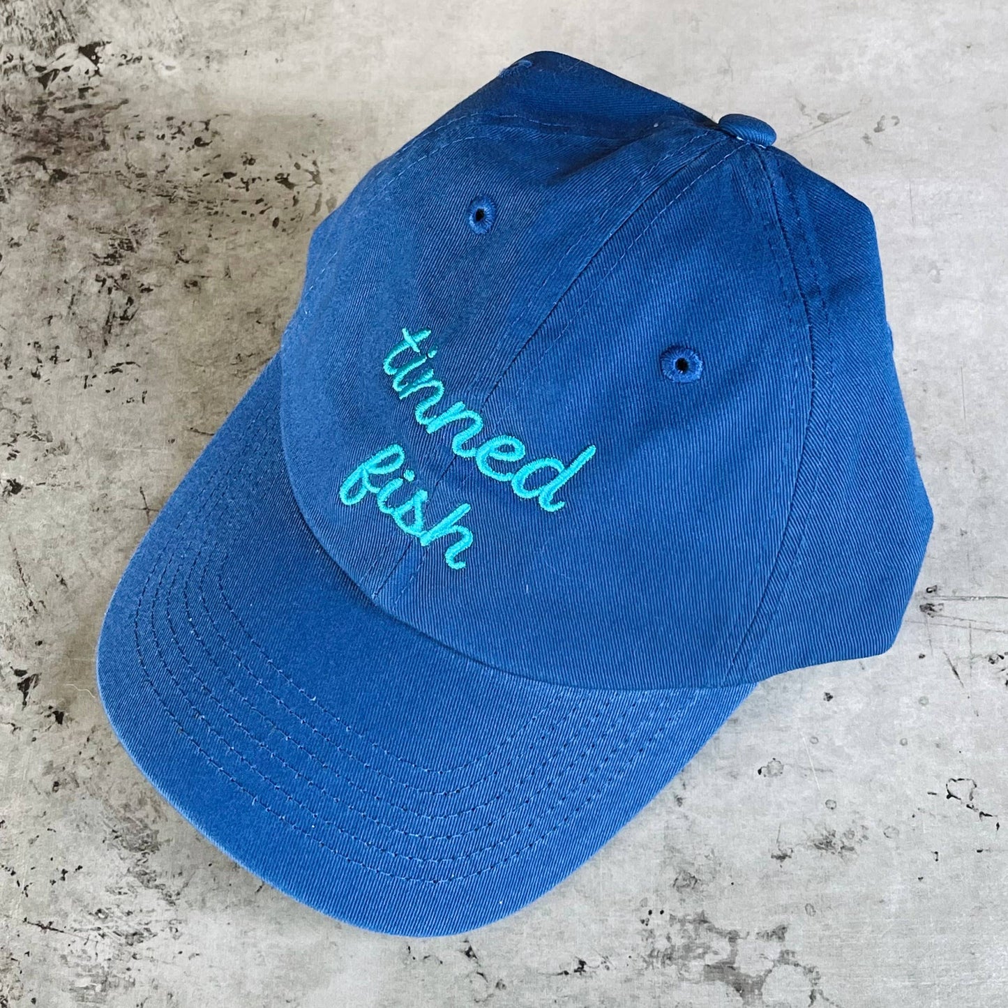 The Silver Spider • “Tinned Fish” Baseball Dad Hat, Blue